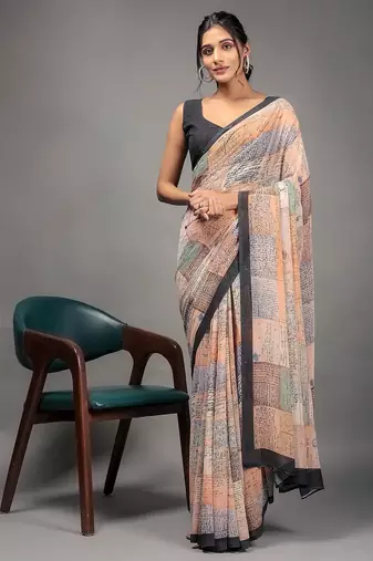 Orange elegant printed georgette saree with blouse piece