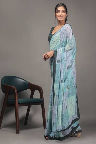 Green elegant printed georgette saree with blouse piece