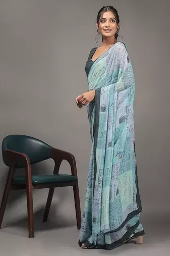Green elegant printed georgette saree with blouse piece