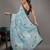 Green elegant printed georgette saree with blouse piece