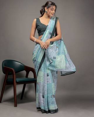 Green elegant printed georgette saree with blouse piece 4