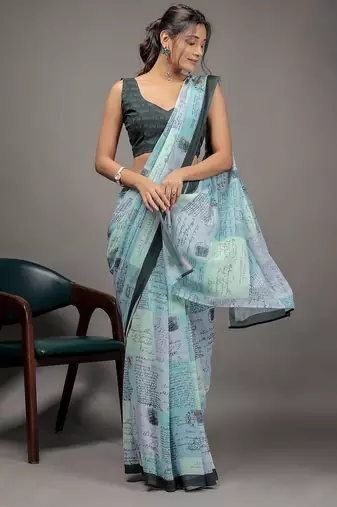 Green elegant printed georgette saree with blouse piece