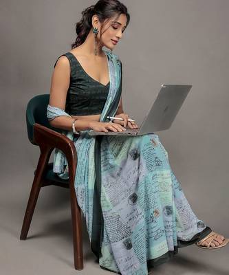 Green elegant printed georgette saree with blouse piece 5