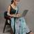 Green elegant printed georgette saree with blouse piece
