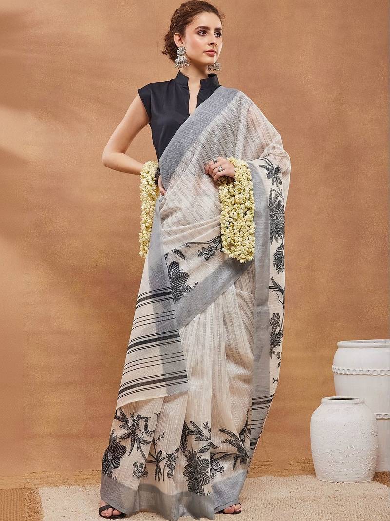 Off white printed silk blend ethnic saree with blouse piece