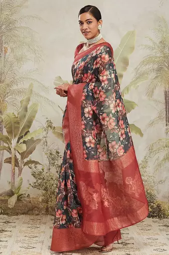 Green printed silk blend ethnic saree with blouse piece
