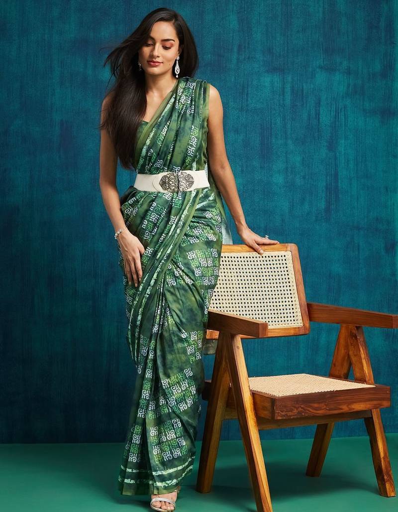 Green printed blended cotton designer saree with blouse piece