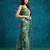Green printed blended cotton designer saree with blouse piece