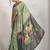 Sea green printed satin fashion saree with blouse piece