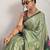 Sea green printed satin fashion saree with blouse piece