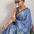 Blue printed satin fashion saree with blouse piece