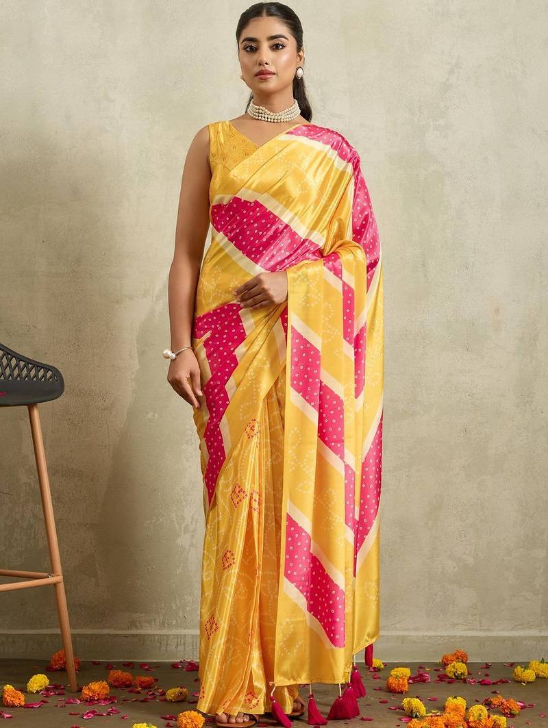 Yellow printed satin fashion saree with blouse piece