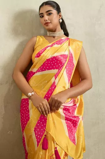 Yellow printed satin fashion saree with blouse piece