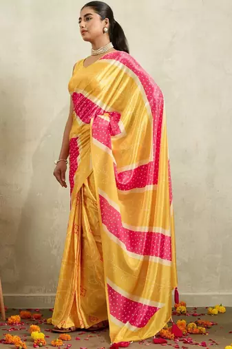 Yellow printed satin fashion saree with blouse piece