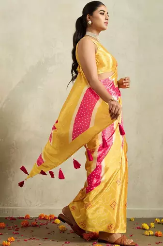 Yellow printed satin fashion saree with blouse piece