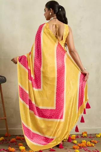 Yellow printed satin fashion saree with blouse piece