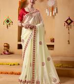 Cream plain tissue festive wear saree with blouse piece