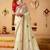 Cream plain tissue festive wear saree with blouse piece