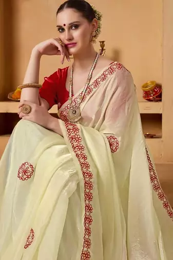 Cream plain tissue festive wear saree with blouse piece