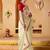 Cream plain tissue festive wear saree with blouse piece