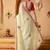Cream plain tissue festive wear saree with blouse piece