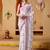 White elegant printed georgette saree with blouse piece