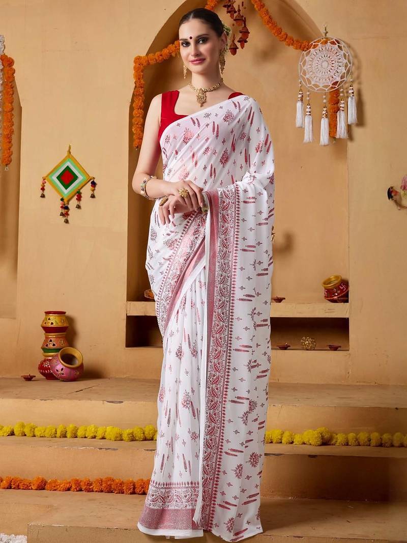 White elegant printed georgette saree with blouse piece
