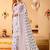White elegant printed georgette saree with blouse piece