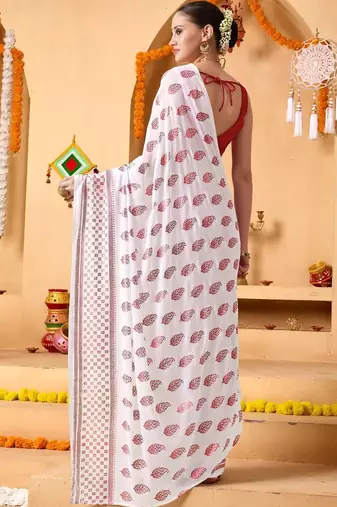 White elegant printed georgette saree with blouse piece