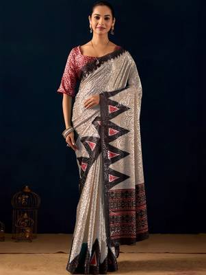 Cream printed brasso casual saree with blouse piece 1