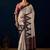 Cream printed brasso casual saree with blouse piece