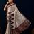 Cream printed brasso casual saree with blouse piece