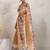 Tan printed blended cotton designer saree with blouse piece