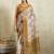 Cream printed blended cotton designer saree with blouse piece