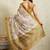 Cream printed blended cotton designer saree with blouse piece
