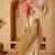 Cream printed art silk traditional saree with blouse piece