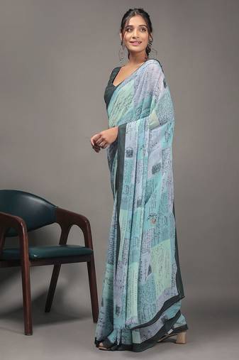 Green elegant printed georgette saree with blouse piece