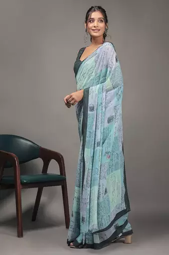 Green elegant printed georgette saree with blouse piece