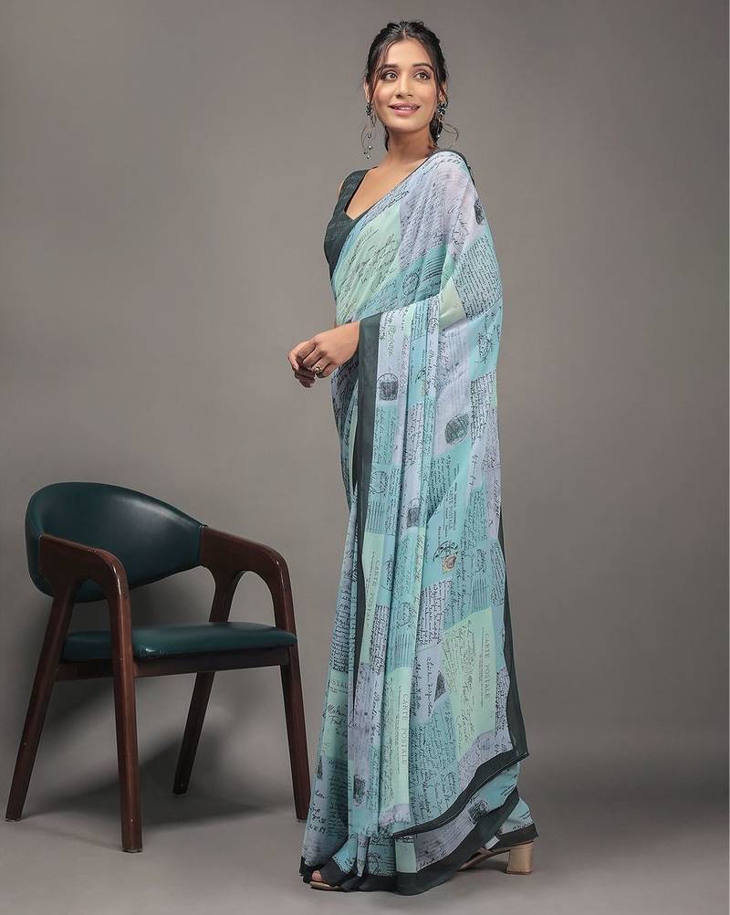 Green elegant printed georgette saree with blouse piece