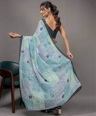 Green elegant printed georgette saree with blouse piece 2