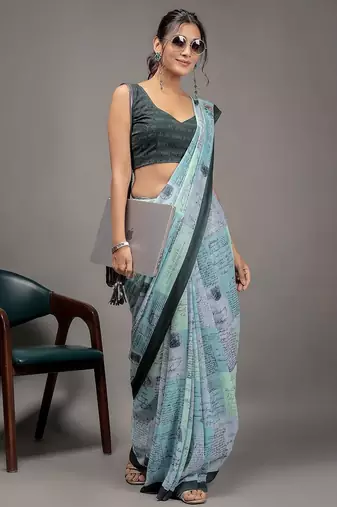 Green elegant printed georgette saree with blouse piece