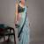 Green elegant printed georgette saree with blouse piece
