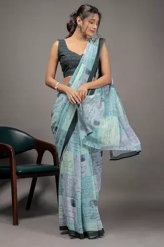 Green elegant printed georgette saree with blouse piece