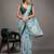 Green elegant printed georgette saree with blouse piece