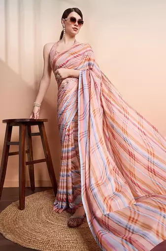 Peach elegant printed georgette saree with blouse piece