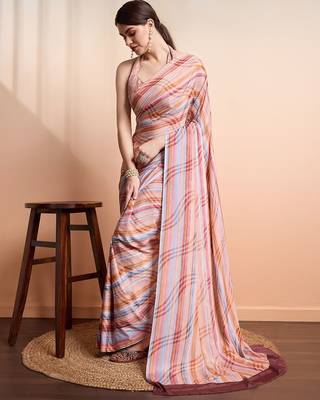 Peach elegant printed georgette saree with blouse piece 2