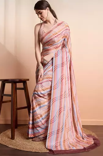Peach elegant printed georgette saree with blouse piece