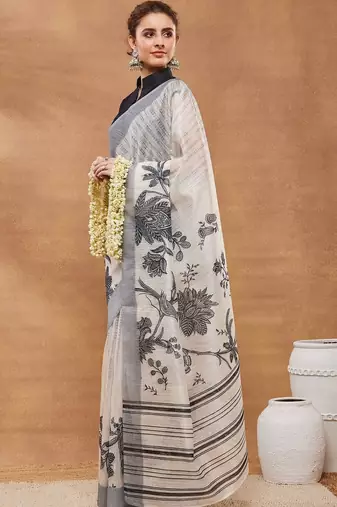 Off white printed silk blend ethnic saree with blouse piece