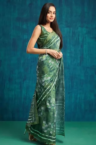 Green printed blended cotton designer saree with blouse piece