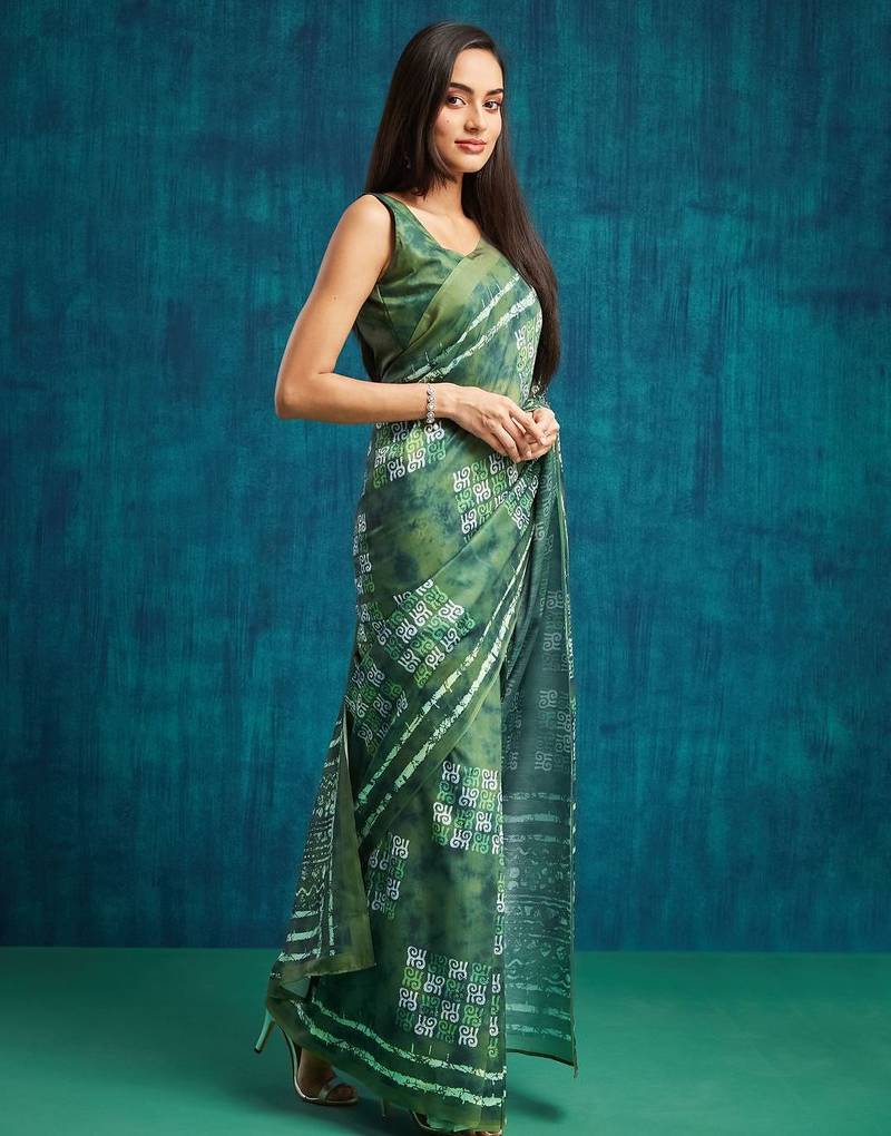 Green printed blended cotton designer saree with blouse piece